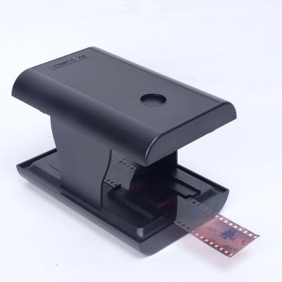 China TON169 Mobile Color Film Scanner lets you scan and play with old 35mm films and slides using your Smartphone camera for sale