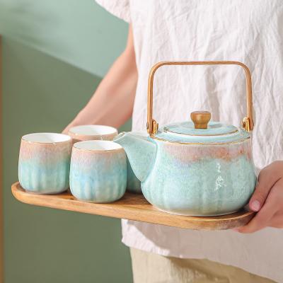 China Viable kiln change luster hit color home tea set creative gift with pot of tea set one tray four cups ceramic tea set gift box for sale