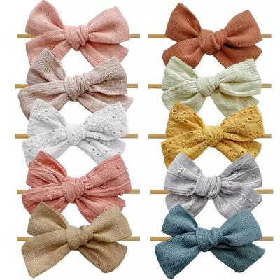 China 10PCS Decoration Baby Bow Headbands Nylon Bows on Nylon Headband for Newborn Infant Toddler for sale