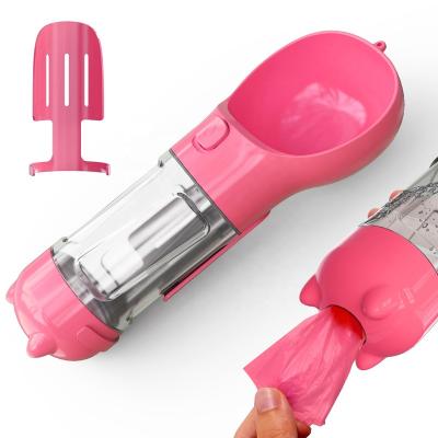 China Sustainable Pink Outdoor Use Small Portable Water Bottle For Dogs With Poop Bags Storage And Poop Scoops for sale