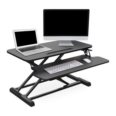 China Pneumatic (height) L07 office workstation adjustable folding table sit stand laptop height adjustable desk riser for sale