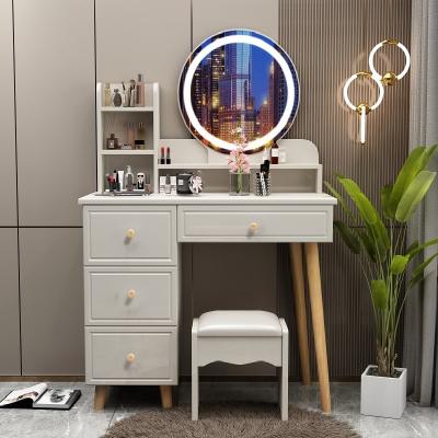 China Cheap Warm White Makeup Table Storage Makeup Storage Modern Vanity Dressing Table With Mirror Light for sale