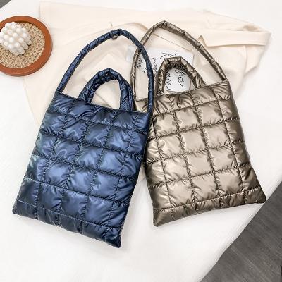 China Fashion Big Soft Down Shoulder Bags For Women Winter Space Cotton New Fashionable Handbags Branded Tender Fluffy Nylon Tote Bags for sale