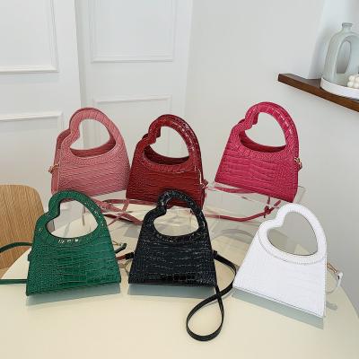 China Waterproof 2022 girls new arrivals female luxury purse bags cute factory small popular handbag for young ladies for sale