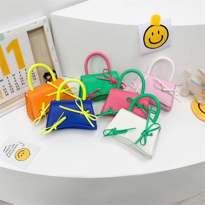 China 2022 new style candy color kids bags waterproof little girl kids spring purses for sale