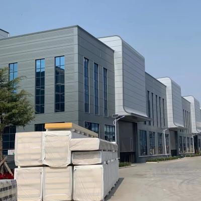 China Rockwool Sandwich Panel Dach Wand Panel Vorgefertigtes Lagerhaus Bauen mit hoher Sicherheit und anpassbares Design zu verkaufen