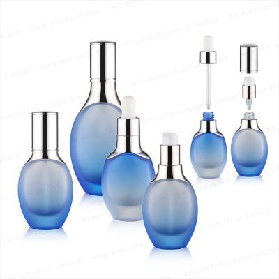 China Personal Care 30ml 50ml Clear Oil Glass Serum Essential Bottles With Gold Collar Aluminum Dropper And Silicone Bulb for sale