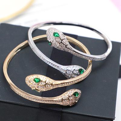 China New Fashion CLASSIC Snake Style Animal Bracelet With Silver And Gold Openings Set With Zirconium Diamond for sale