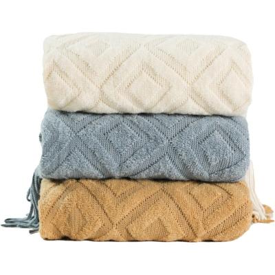 China Diamond Plaid Jacquard Office Nap Sofa Blanket Decor Knitted Throw Anti-Static Blanket with Tassels for sale