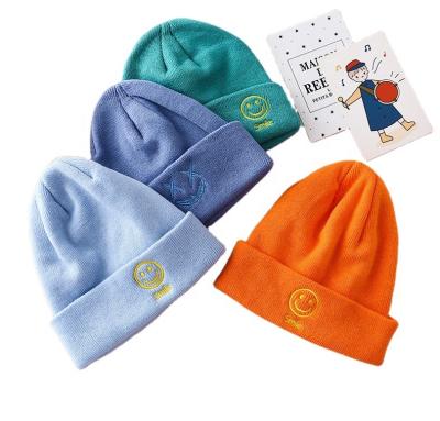 China Cute Cartoon Smiling Face Hat Autumn Winter Student Cashmere Knitted Embroidered Hats COMMON for sale