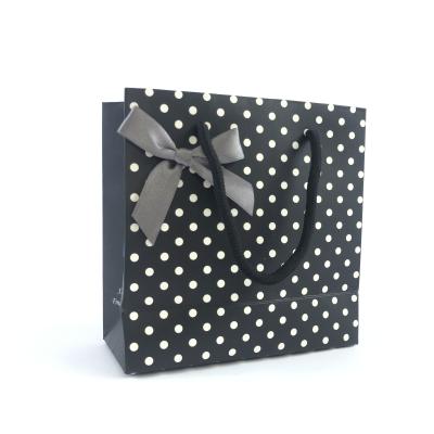 China Recycled Materials Wholesale Custom Printed Black Luxury Shopping Gift Wedding Paper Bag With Handle for sale