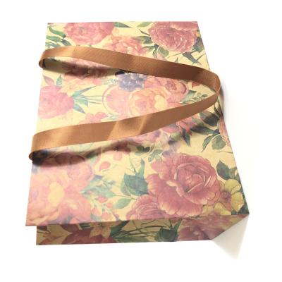 China Hot Wholesale Custom Luxury Cheap Recyclable Attractive And Durable Flower Kraft Paper Gift Bags for sale