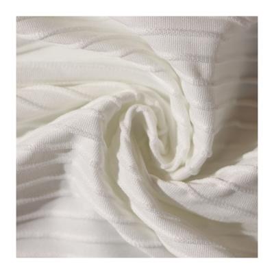 China simple style solid white stair cloth swimwear fabric 82% nylon 18% spandex jacquard fabric for sale