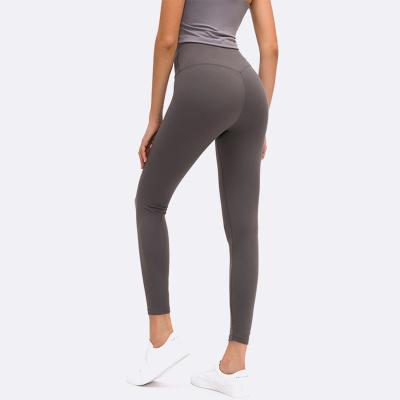 China Breathable Wholesale Women Yoga Pants High Waisted Sports Fitness Workout Leggings Seamless Custom for sale