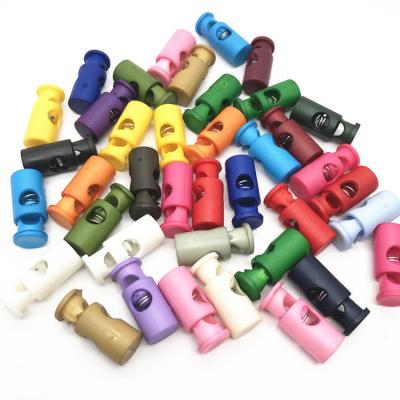 China Waterproof Custom Plastic Cord Spring Rope Stoppers Tie Lock For Hoodies Sports Clothes for sale