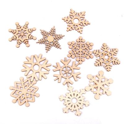 China Europe Wooden Christmas Tree Pendant Hanging Decorations 10pcs Assorted Wood Snowflakes Laser Cut for sale