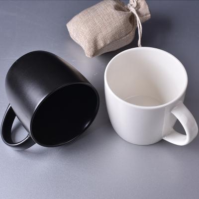 China Viable Custom Logo 450ML Round Handle Single Coffee Milk Jug White / Black Ceramic Mug for sale