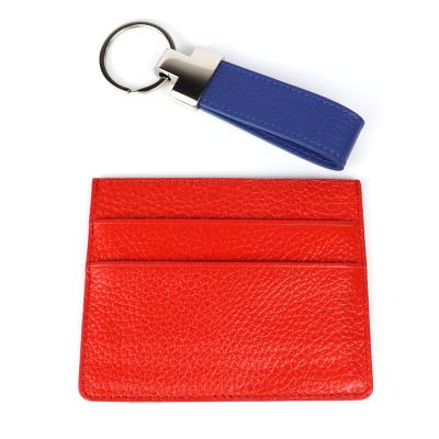 China Genuine Pebble Red Color Cowhide Leather Card Holder Credit Card Holder Key Chain Wallet Men Women Purse Wholesale Dark Blue Leather Coin Purse for sale