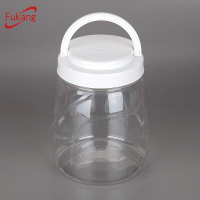 Cina hot sale 1000ml wide neck transparent pet restaurant plastic bottle with handing screw lid in vendita