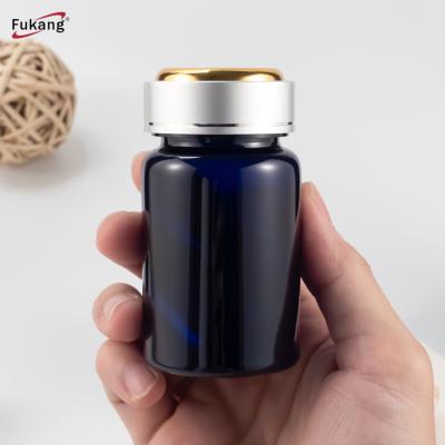 中国 100ml PET various colors plastic bottle with flip top cap for pill packaging 販売のため