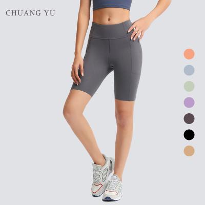 China Custom High Waisted Athleisure Gym Sport Wear Workout Women Yoga Pants Wholesale Warm Breathable Fitness Gaiters With Pockets for sale