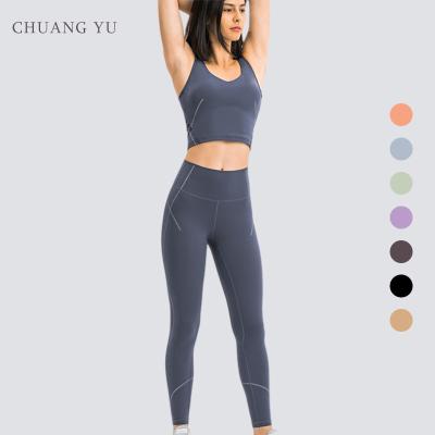 China Windproof Yoga Suit 2 Piece Sports Shirts Crop Top Seamless Leggings Sports Gym Set Clothes Fitness Workout Set Seamless Leggings 2022 for sale