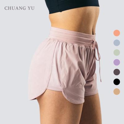 China CHUANG YU Summer Hot Beach Anti-wrinkle Solid Color Soft Elastic Sports Pants Polyester Women Workout Yoga Booty Shorts Shorter Shorts for sale