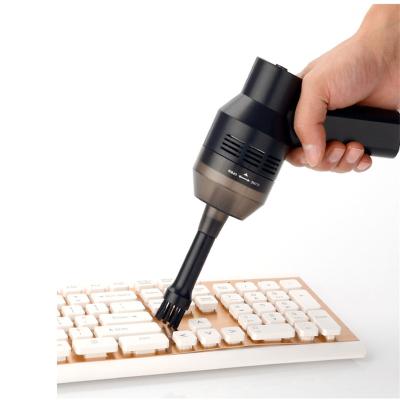 China Portable Handheld Wireless Cordless USB Rechargeable Car Mini Keyboard Vacuum Cleaner Use For Household Car Window Gap Dust Remover for sale