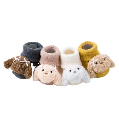 China Children's Soft And Warm Coral Pattern Dog Cartoon Glue Floor Velvet Baby Tube Breathable Medium Socks Autumn And Winter for sale