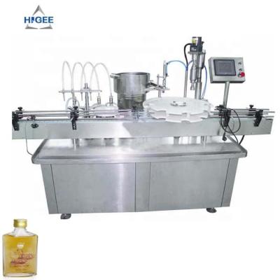 China APPAREL 100ml Brandy Vodka Whiskey Rum Filling Machine Automatic Capping Labeling Machine for sale