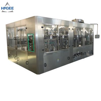 China Beverage with cleaning function glass bottle cocktail filling machine /soda filling machine/small carbonated beverage filling machine for sale