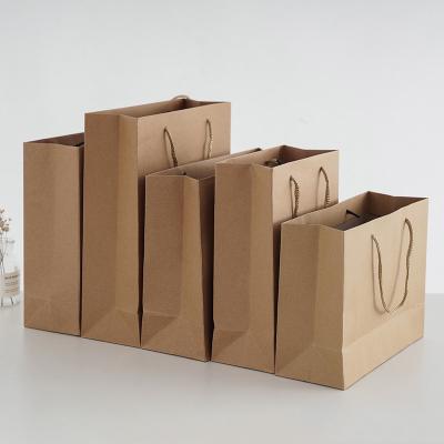 China Craft Custom Brown Kraft Paper Bag Disposable Gift Recycled Paper Shopping Bag With Handle for sale