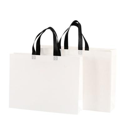 China Wholesale handled ultrasonic non woven dust bag for handbag shopping mall for sale