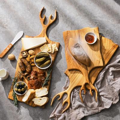 China Woodsun Sustainable Deer Head Design Wooden Cutting Board Cutting Plates for sale