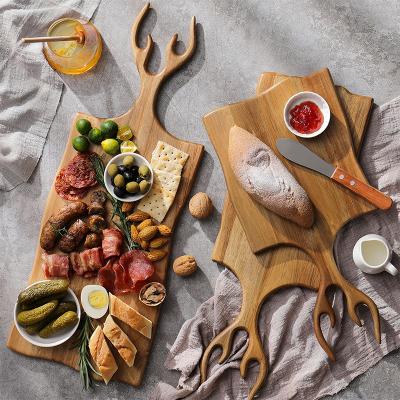 China Custom Muti-Purpose Wooden Boards For Serving Food Tray With Handle Legs for sale