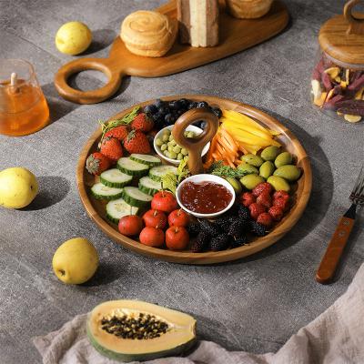 China Sustainable Custom Round Wooden Chip And Dip Snacks Food Dish With Handle Ring for sale