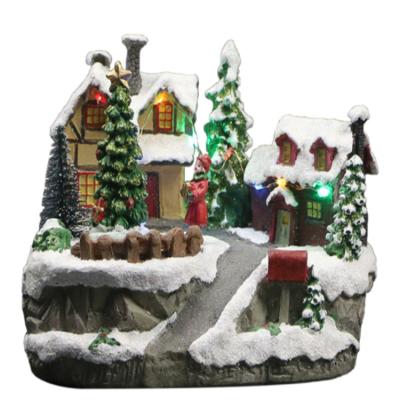 China Artificial Resin Christmas House With Led Light And Christmas Tree Village Christmas Moving Resin for sale