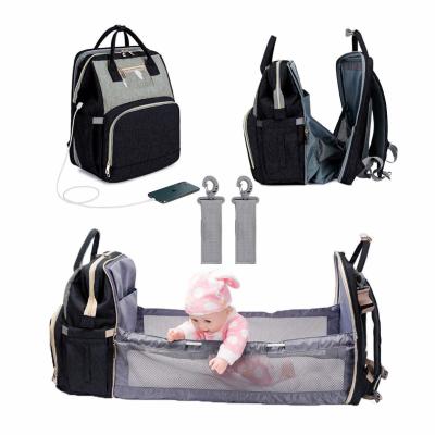 China Foldable Backpack Baby Crib 3 in 1 Waterproof Diaper Bag Backpack Travel Bag with USB Charging Baby Changing Bag for sale