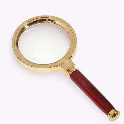 China ABS Factory Direct Mahogany Handle 60mm 70mm 80mm Portable 90mm Handheld Magnifier Various Specifications for sale