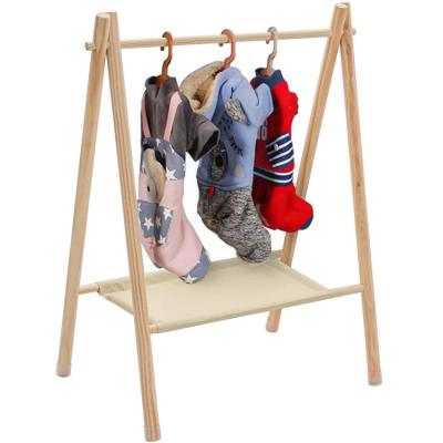 China Minimalist Indoor Baby Doll Clothes Storage Wooden Pet Standing Hanger for sale