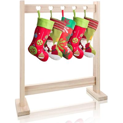 China Minimalist Stocking Holder Christmas Decoration Holiday Party Indoor Wooden Standing Hanger for sale