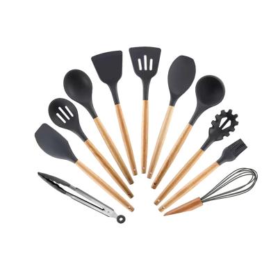 China OEM Products 100% Sustainable Kitchen Silicone Cookware Set Korea Hot Selling Food Grade Eco-friendly Cookware With Wooden Handle for sale