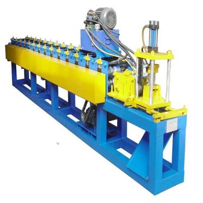 China 85mm XHH JM85 Color Price Steel Roll Automatic Sheet Forming Rolling Shutter Door Frame Machine for sale