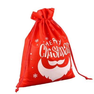 China OEM Handled Eco Friendly Cartoon Printed To Recycle Christmas Non Woven Drawstring Gift Bag for sale