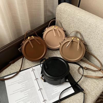 China Fashion 2021 Korean Styles Fashion Girls Handbags Bag Small Round Shape Wallet Mobile Messenger Shoulder Bags for sale