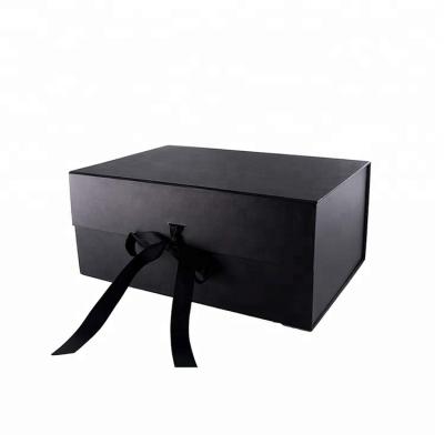 China Factory Handmade Cheap Thick Black Cardboard Magnetic Folding Gift Box With Ribbon for sale