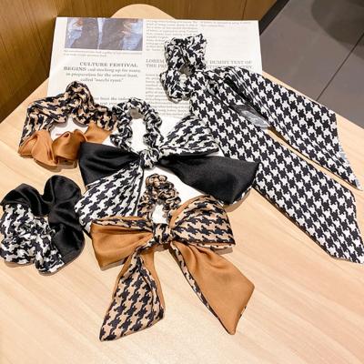 China New fashion two color European and American style stitching one thousand unique elastic hair Ring Ladies Bow Hair Rope large intestine bird plaid headband for sale