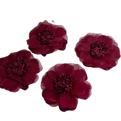 China Natural touch wholesale selling accessory for girls 2022 fashion artificial flower handmade satin flower for cloth and headband for sale