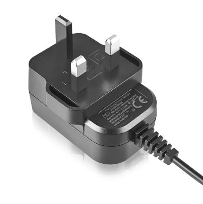 China EU UK US Plug 5V 12V 2A Power Adapter 500mA 0.5A 1A 9V Power Adapter EN-1203 for sale