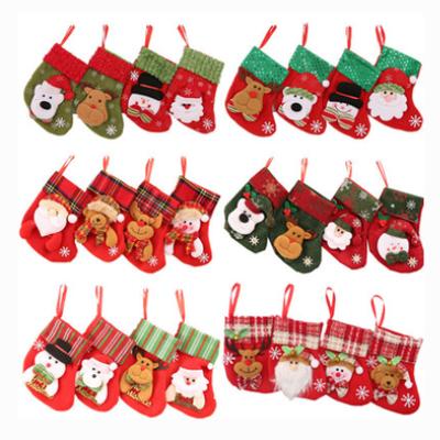 China Small Fabric Christmas Stocking Candy Sack Christmas Tree Hanging Gift Bag Pendant For Christmas Decorations for sale